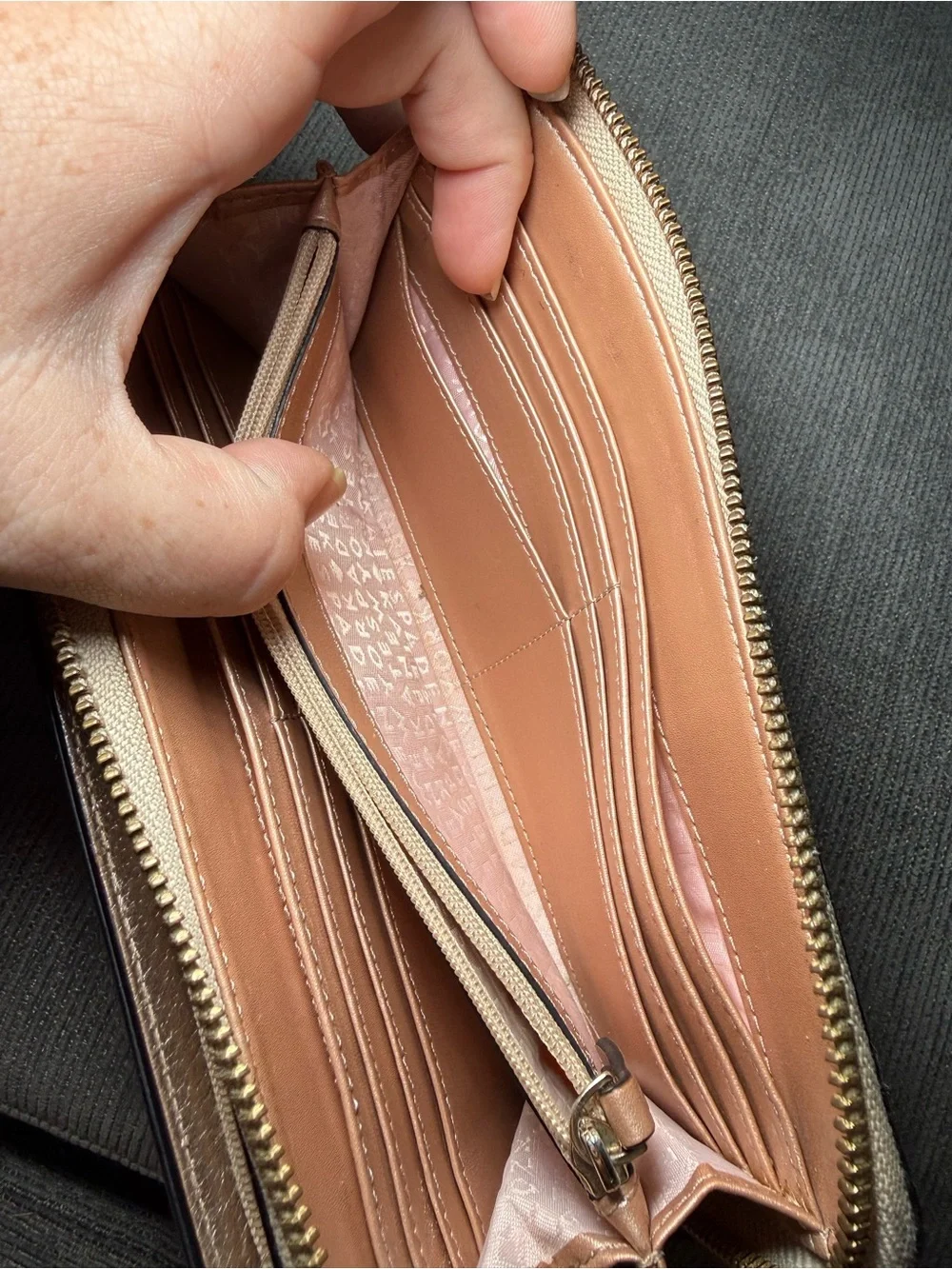 Kate spade Metallic Rose Gold Wristlet Wallet with Zip Closure